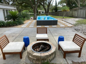 Reel relaxing across from River in Huge 24 foot Swim Spa